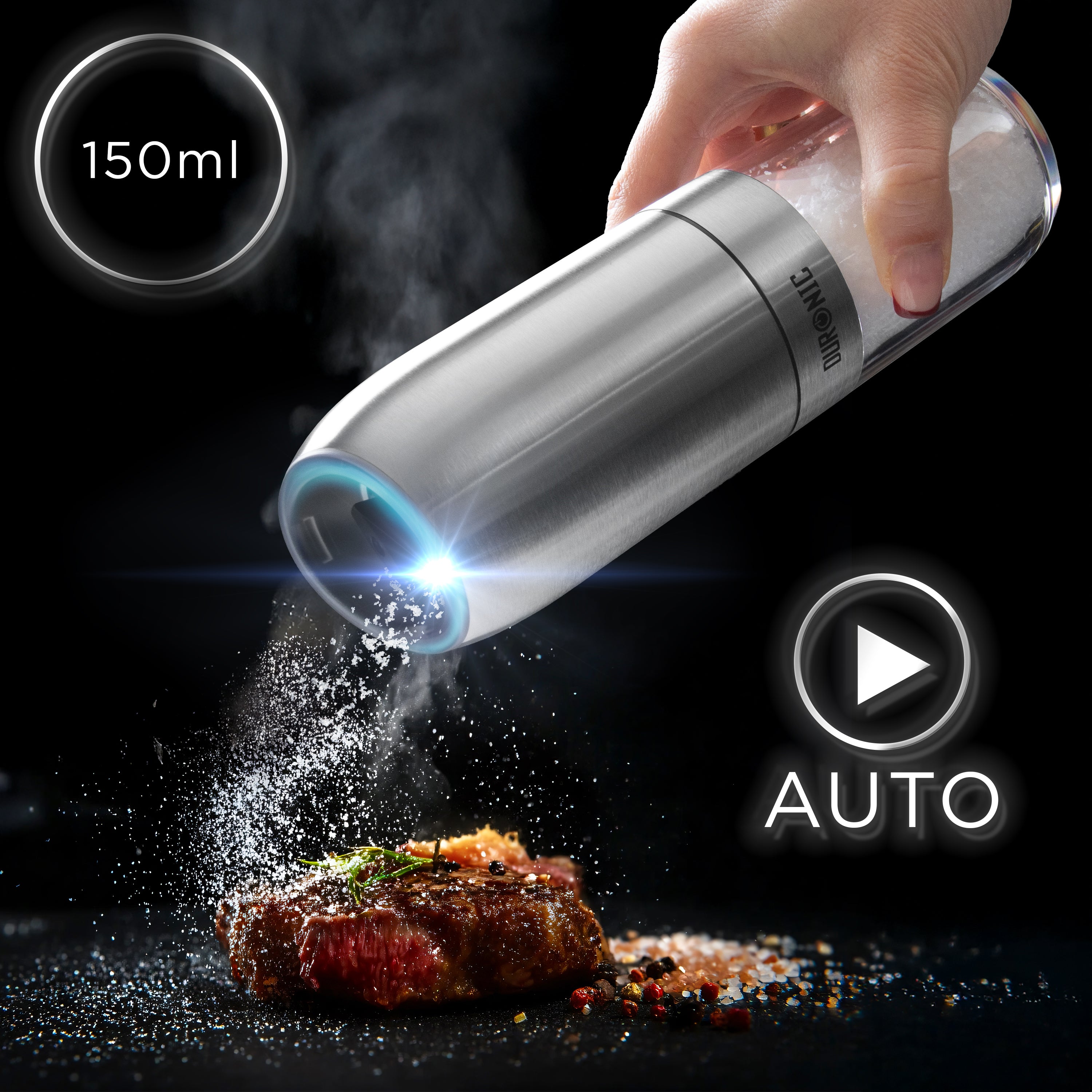 Duronic Electric Salt and Pepper Grinder Set dispensing seasoning onto a cooked steak.
