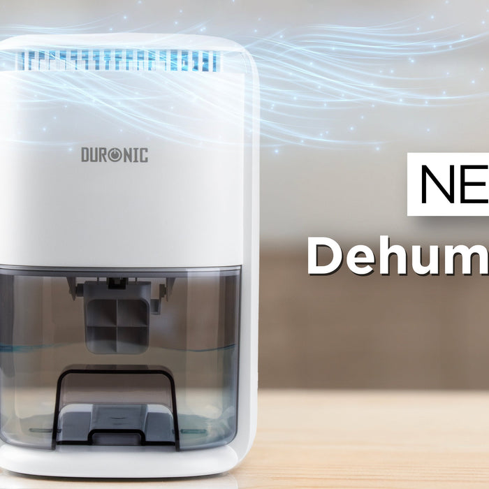Dehumidifier beside an indoor clothes airer in a cosy UK home, illustrating winter electricity running costs and energy-saving tips.