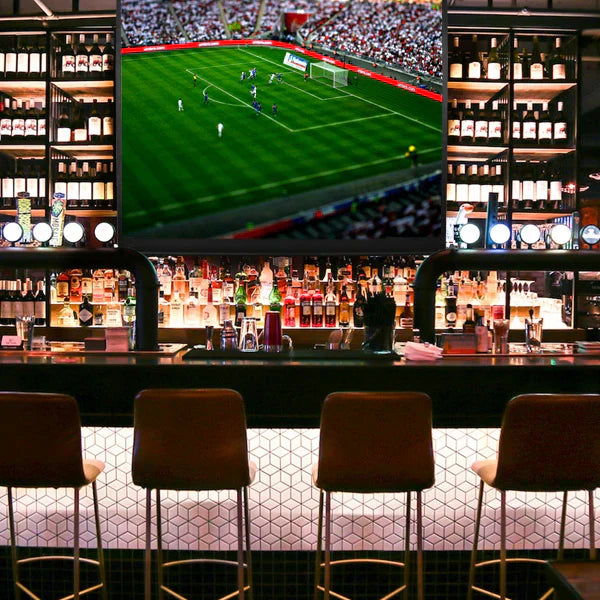 Football match being shown in a pub using the Duronic projector screen