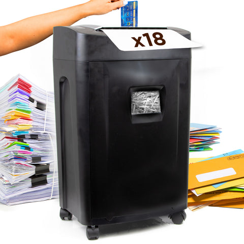 Duronic 18 Sheet XXL Cross Cut Paper Shredder cutting a credit card next to large stacks of documents and mail.