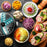 Duronic 2-in-1 Mini Food Processor and Chopper surrounded by fresh sliced, shredded, and plated vegetables.