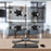 Duronic Computer Monitor Arms holding four screens in a 2x2 configuration on a desk.