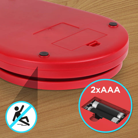 Duronic Digital Kitchen Scale showing two AAA batteries compartment and non-slip rubber feet on bottom.