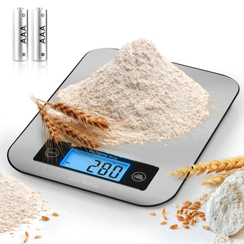 Duronic Digital Kitchen Scales weighing flour, featuring a blue LCD display and included AAA batteries.