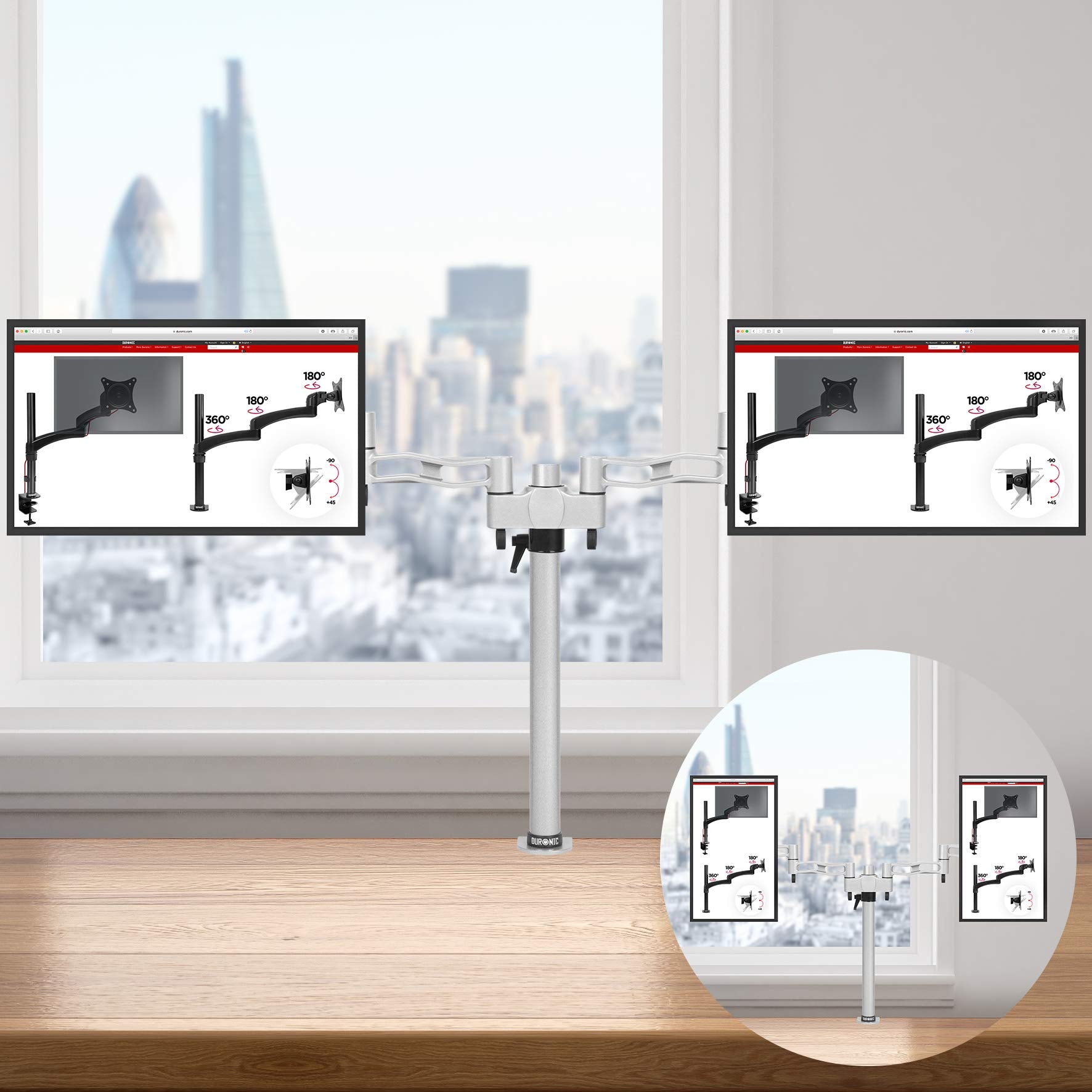 Duronic Dual Monitor Stand holding two computer screens in front of a window