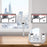 Duronic Dual Monitor Stand holding two computer screens in front of a window