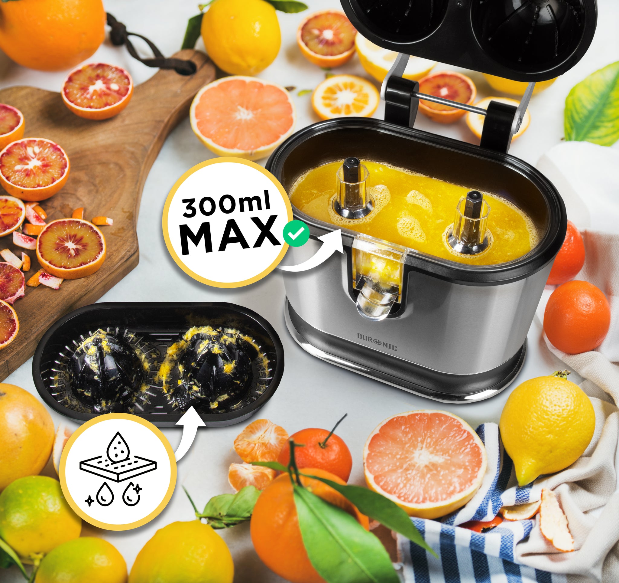 Duronic Electric Citrus Juicer showing 300ml max capacity surrounded by fresh sliced citrus fruits.