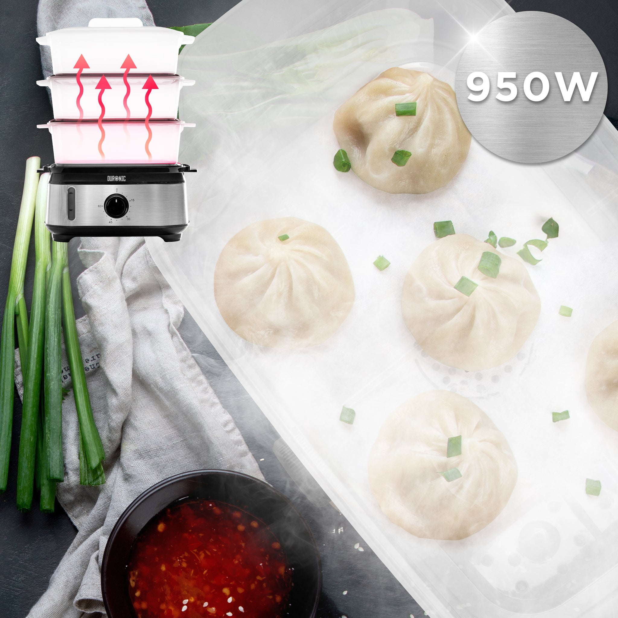 Duronic Electric Food Steamer steaming hot dumplings served with dipping sauce and scallions.