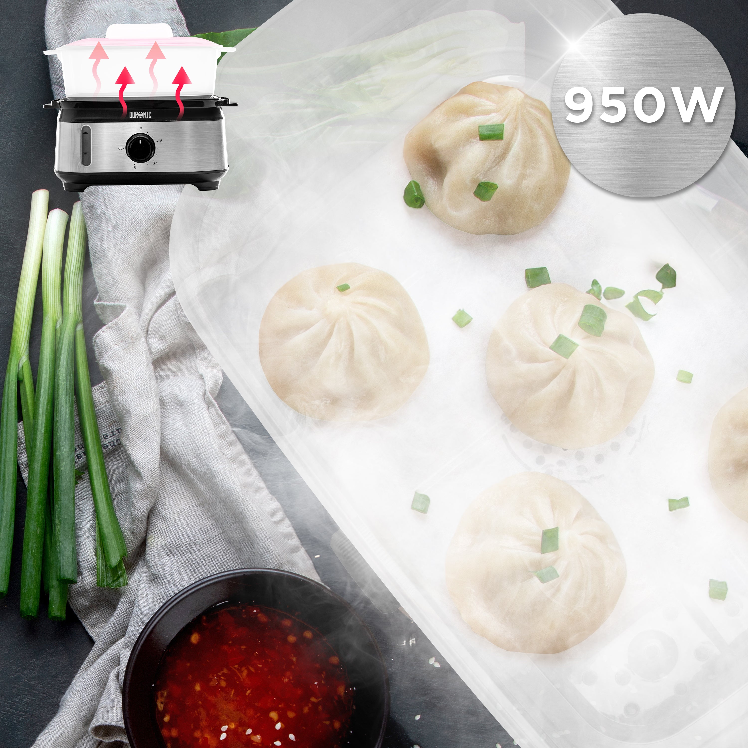 Duronic FS91 BK Black Electric Food Steamer with green onions and dipping sauce nearby.