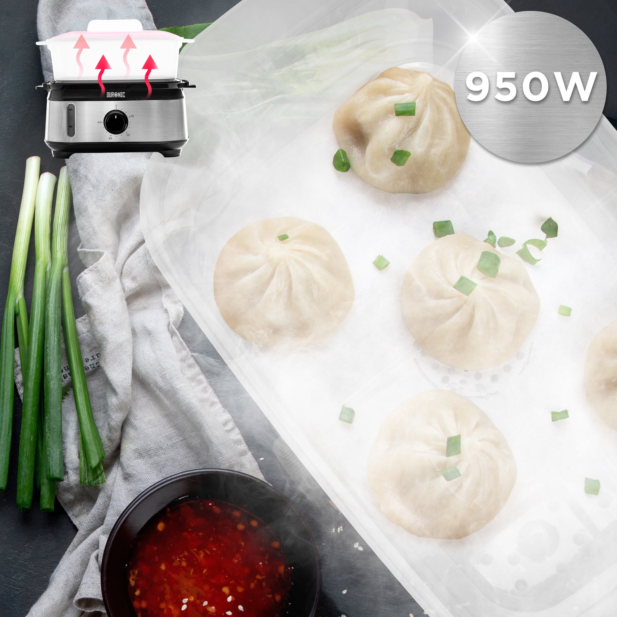 Duronic FS91 BK Black Electric Food Steamer with green onions and dipping sauce nearby.