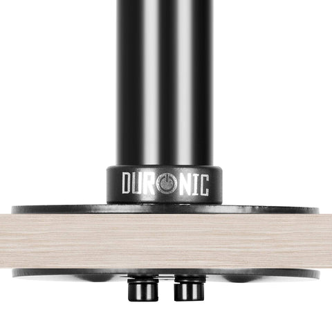 Duronic Grommet securely clamped to a light wood desk surface.