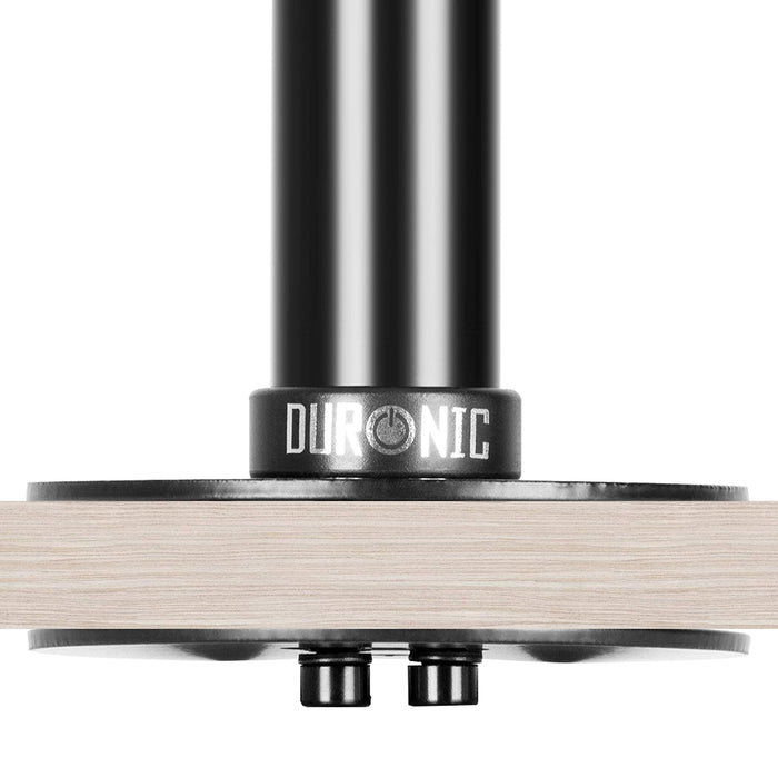 Duronic Grommet securely clamped to a light wood desk surface.