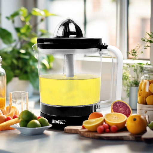 Duronic JE416 citrus juicer making fresh juice surrounded by ingredients like lemons, grapefruits, limes
