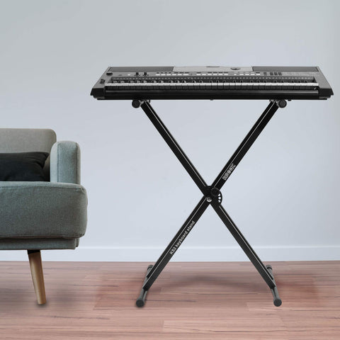 Duronic Keyboard Stand supporting an electronic musical keyboard in a living room.