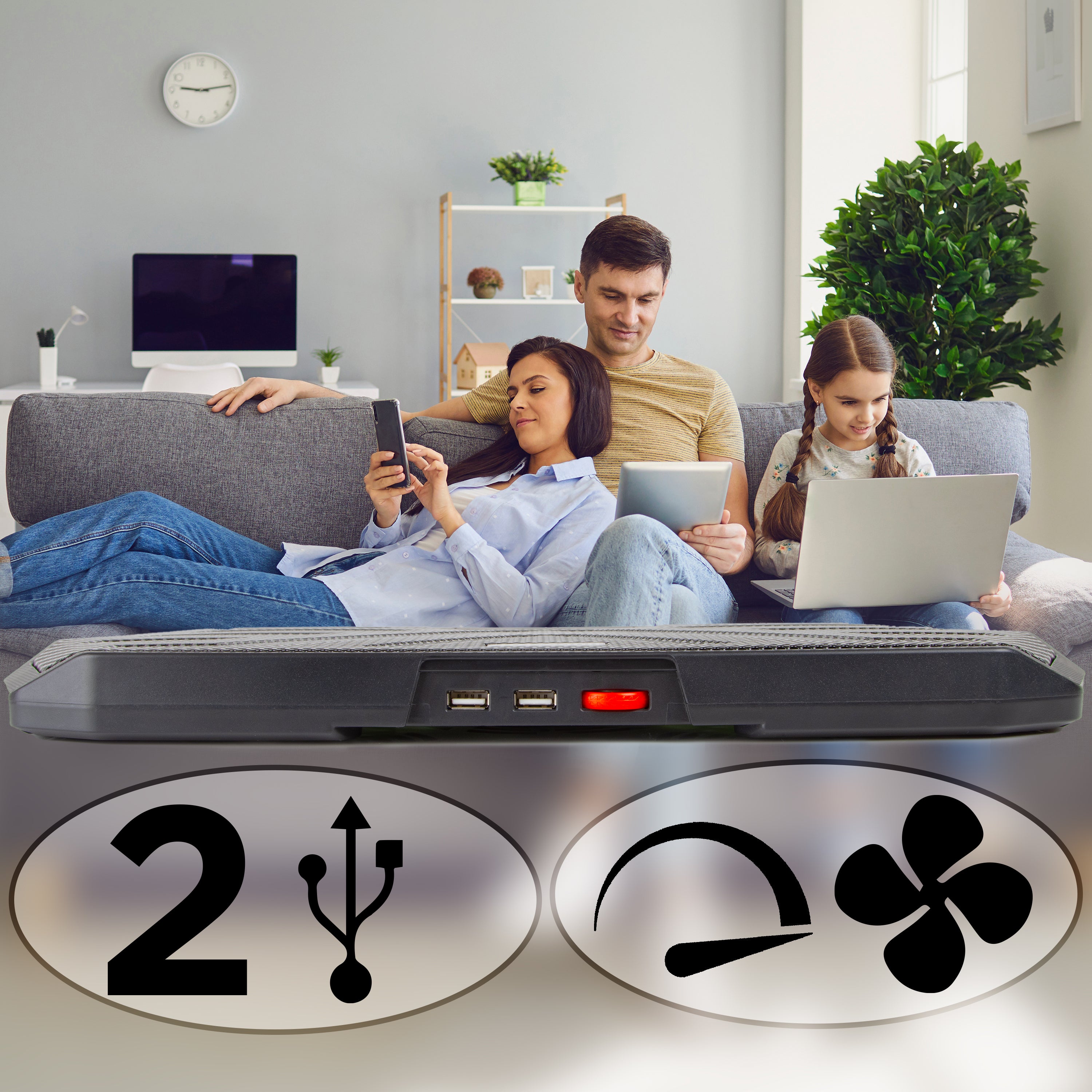 Duronic Laptop Cooling Pad with two USB ports and a power switch is shown in front of a family using multiple devices on a couch.