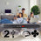 Duronic Laptop Cooling Pad with two USB ports and a power switch is shown in front of a family using multiple devices on a couch.