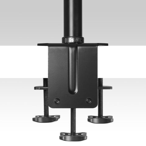Duronic Monitor Stand Pole attached to a tabletop for dual monitor stands..
