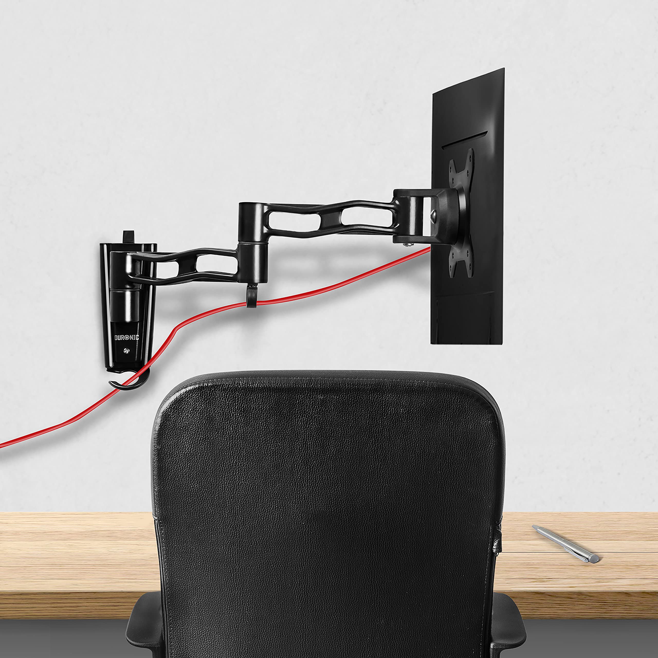 Duronic Monitor Wall Mount holding a computer monitor above a wooden office desk.