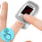 Duronic Oximeter displaying a 99% blood oxygen saturation level on its LED screen while clipped onto a person's index finger.