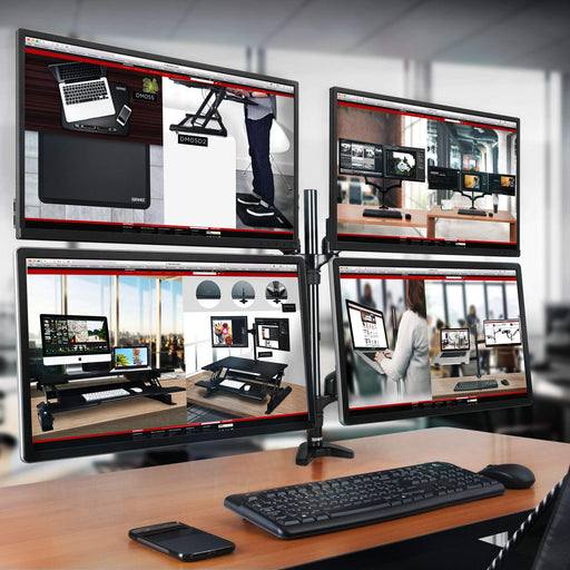 Duronic Quad Monitor Arm Stand displaying workspace product pages with a keyboard and smartphone in front.