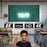 Duronic SFPS100 Projector Screens Gemini said with a young boy points upward in a classroom toward a large screen displaying "16/9" and educational graphics, with icons for 8K, 1080p, HD, and 4K resolution below it.