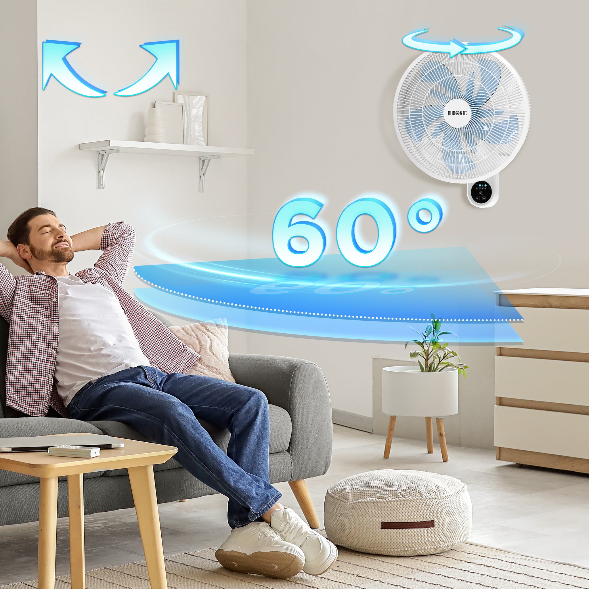 Duronic Wall Mounted Fan with a man relaxes on sofa