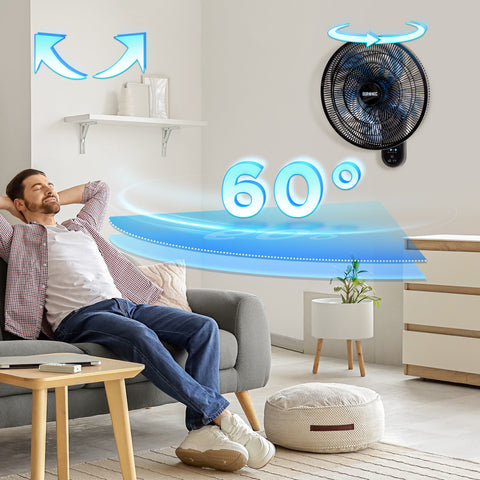 Duronic Wall Mounted Fan with a man relaxing on a living room sofa