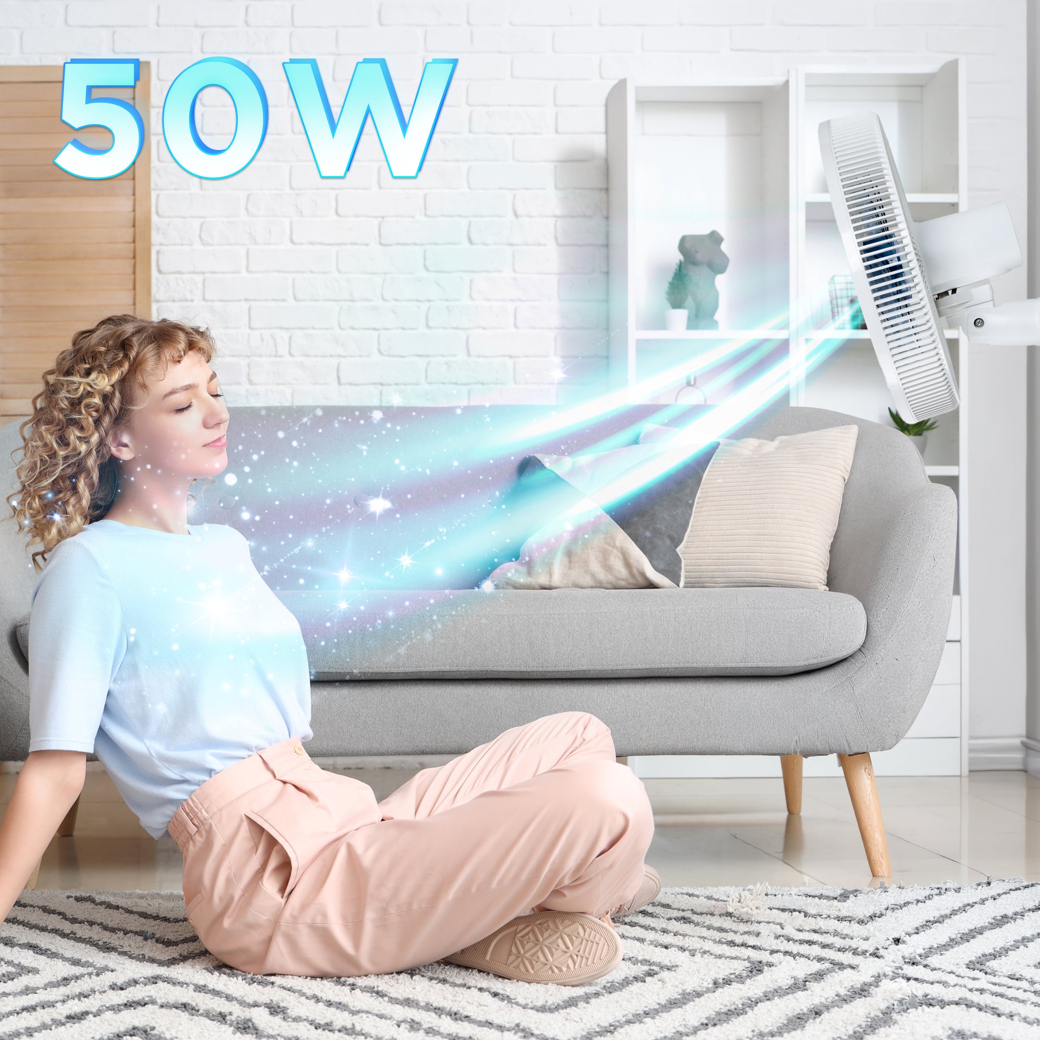 Duronic Wall Mounted Fan with a woman relaxes on the floor enjoying the powerful breeze