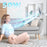Duronic Wall Mounted Fan with a woman relaxes on the floor enjoying the powerful breeze