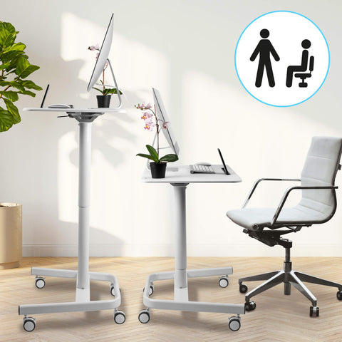 Duronic Sit-Stand Desk shown in sitting and standing positions with office chair.