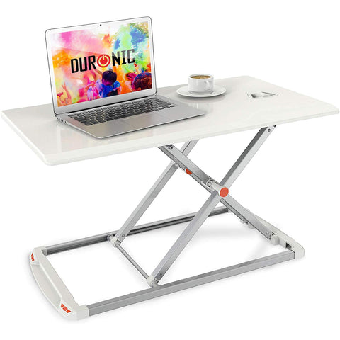 Duronic Sit-Stand Desk with laptop and coffee cup, featuring an adjustable X-frame design.