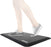 Duronic Anti-Fatigue Mat with a person wearing black sneakers stands on the mat
