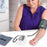 Duronic Blood Pressure Monitor used by a woman to monitor blood pressure
