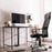 Duronic Cable Management Spine sleek black cable management spine neatly organizes wires under a wooden desk