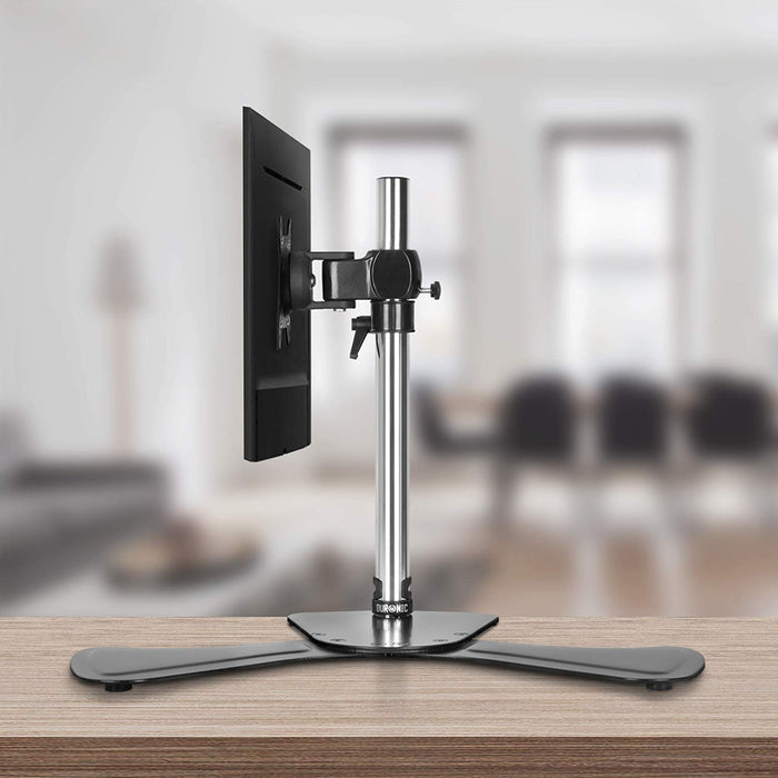 Duronic Computer Monitor Arms Stand with a black base, silver pole, and mounted flat-screen display.
