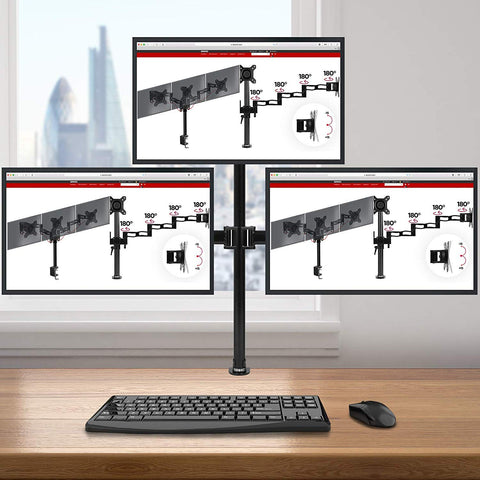 Duronic Computer Monitor Arms holding three screens above a desk with a keyboard and mouse.