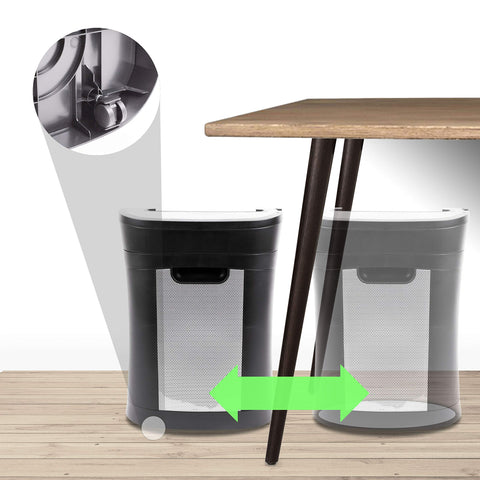 Duronic Cross Cut Paper Shredder shown sliding smoothly in and out from under a desk.