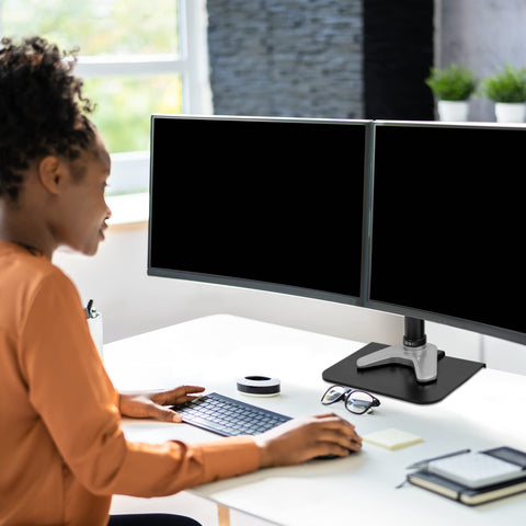 Duronic Desk Mount Reinforcement Plate with woman working at a white desk