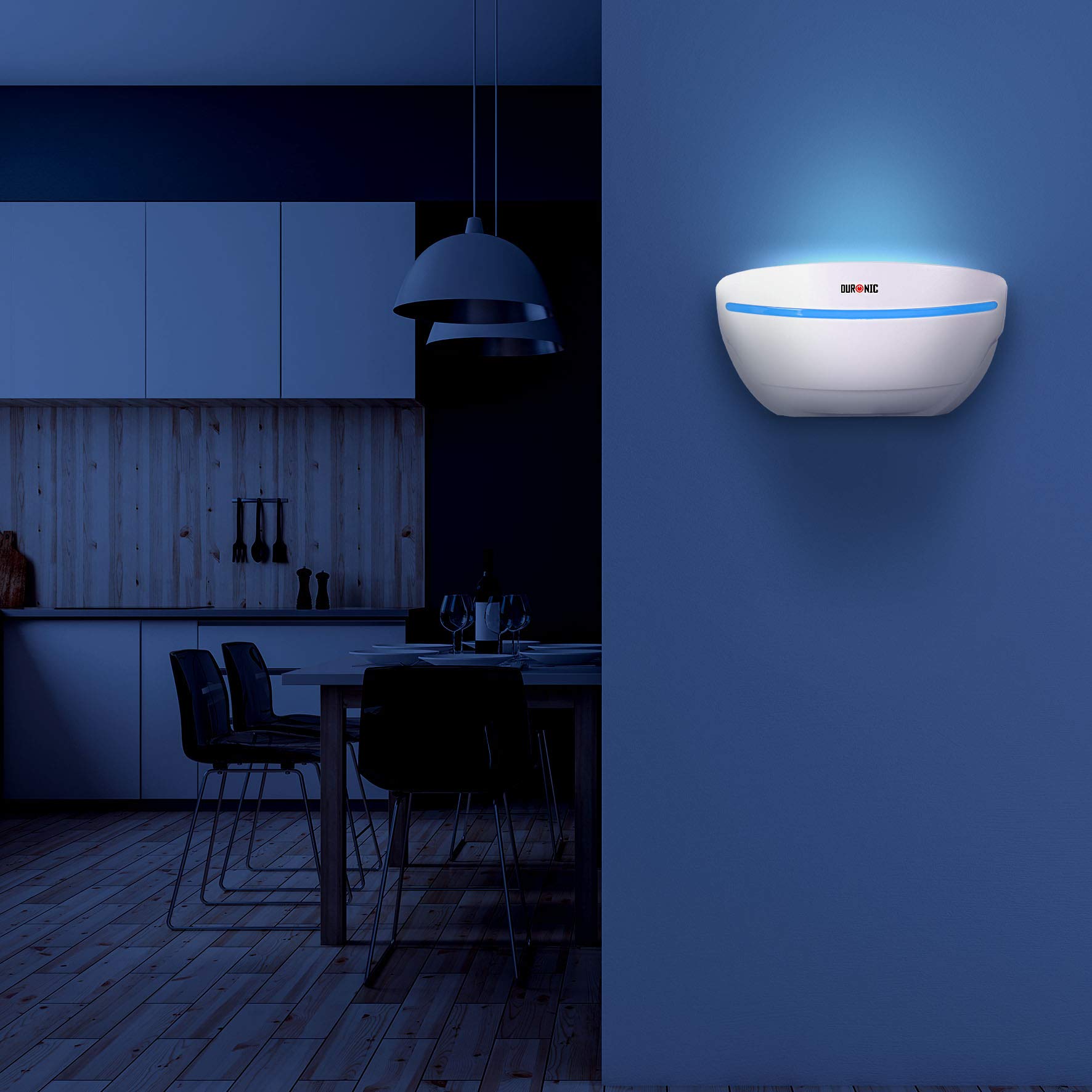 Duronic Electric Fly Catcher Sconce glowing in a dark kitchen and dining area.