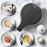 Duronic Electric Kettle surrounded by four assorted tea cups on marble.