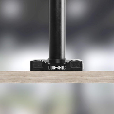 Duronic Grommet 3 clamp base securely attached to a light wood desk surface.
