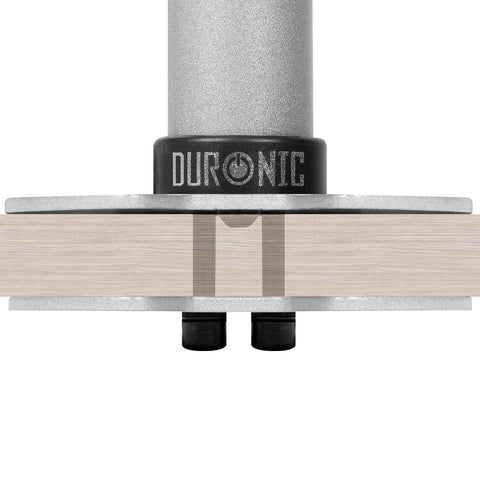 Duronic Grommet mount monitor arm base securely attached through a wooden desk with dual bolts.