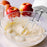 Duronic Hand Mixer Electric Whisk with apples and eggs in the background.