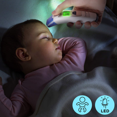 Duronic IRT1000 forehead thermometer scanning a baby's forehead while sleeping to see if temperature is optimal