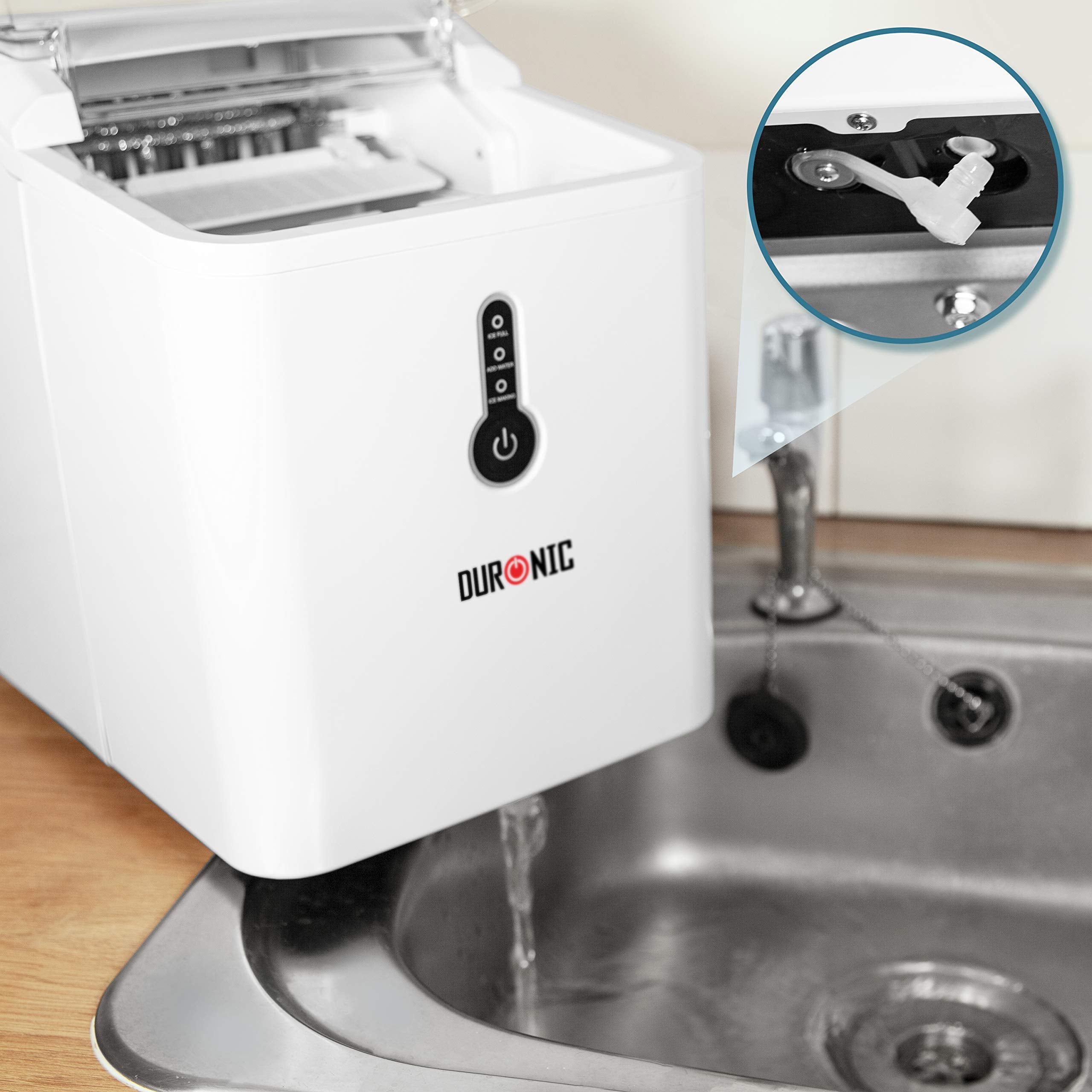 Duronic Ice Maker draining water into a kitchen sink with close-up of drain plug.
