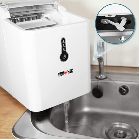 Duronic Ice Maker draining water into a kitchen sink with close-up of drain plug.