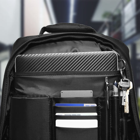 Duronic Laptop Backpack displaying organized inner compartments filled with a laptop, cards, pens, and keys.