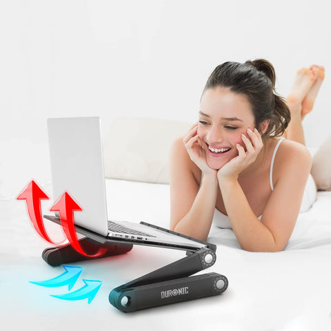 Duronic Laptop Stand with woman lying on a bed using a laptop