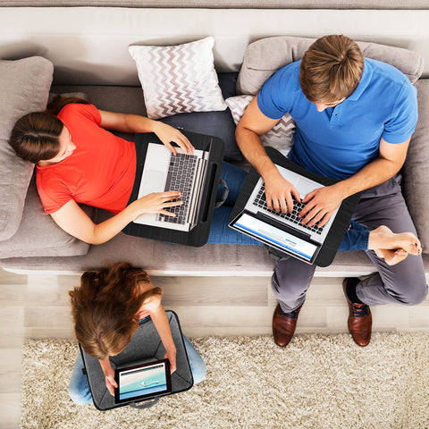 Duronic Laptop Tray with a family on sofa and rug using laptops and tablet