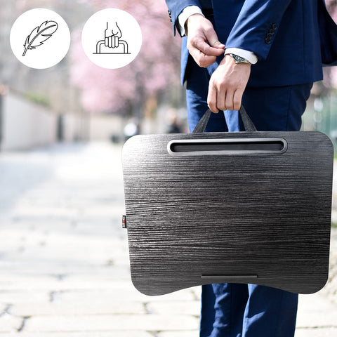 Duronic Laptop Tray with a man in a suit carrying the lightweight tray